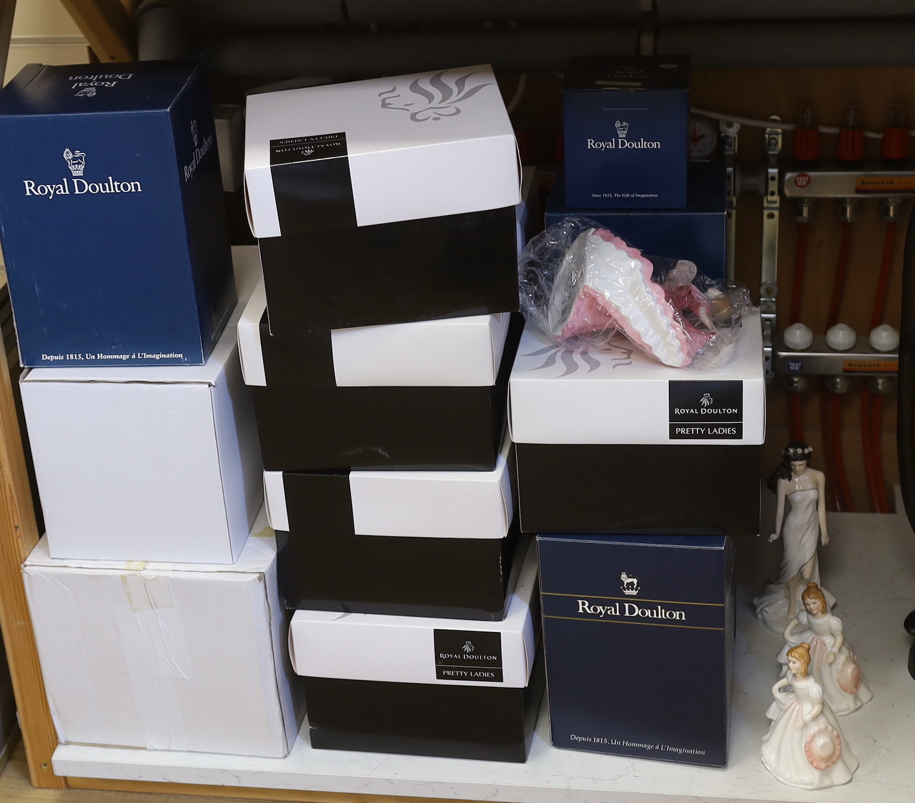 Thirteen Royal Doulton figures and two Royal Worcester figures, all boxed, together with four other unboxed figurines